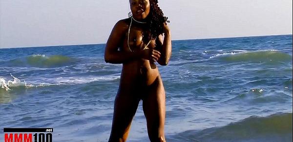  Hot black Nancy Love stripping by the sea